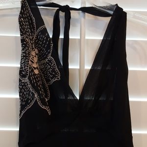 Black halter dress with white flowers